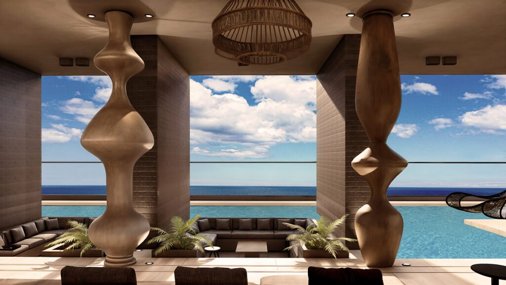 Oceanfront luxury amenity area with infinity pool, outdoor lounge seating, and panoramic sea views