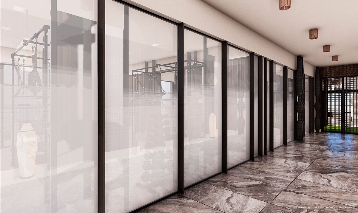 Contemporary fitness center with glass walls, modern equipment, and wellness facilities in a luxury residence